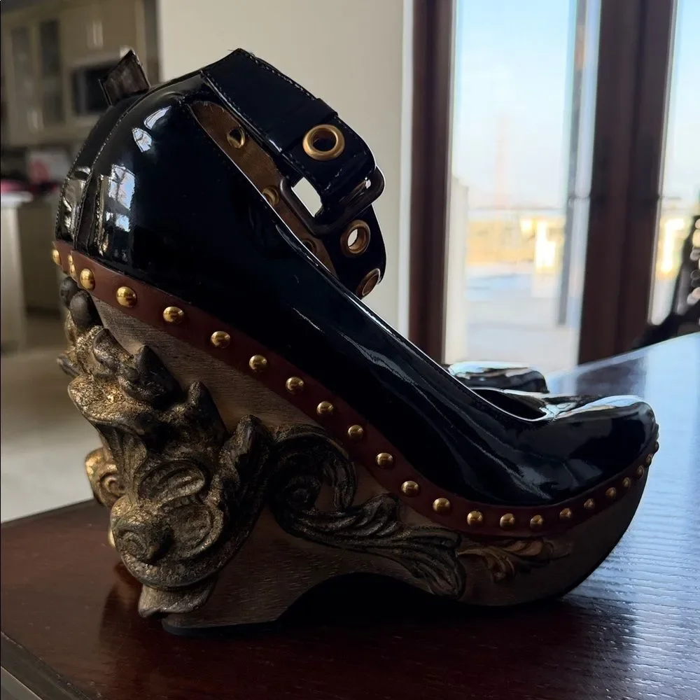 Miu Miu Black Heels with Sculpted Gold Accents